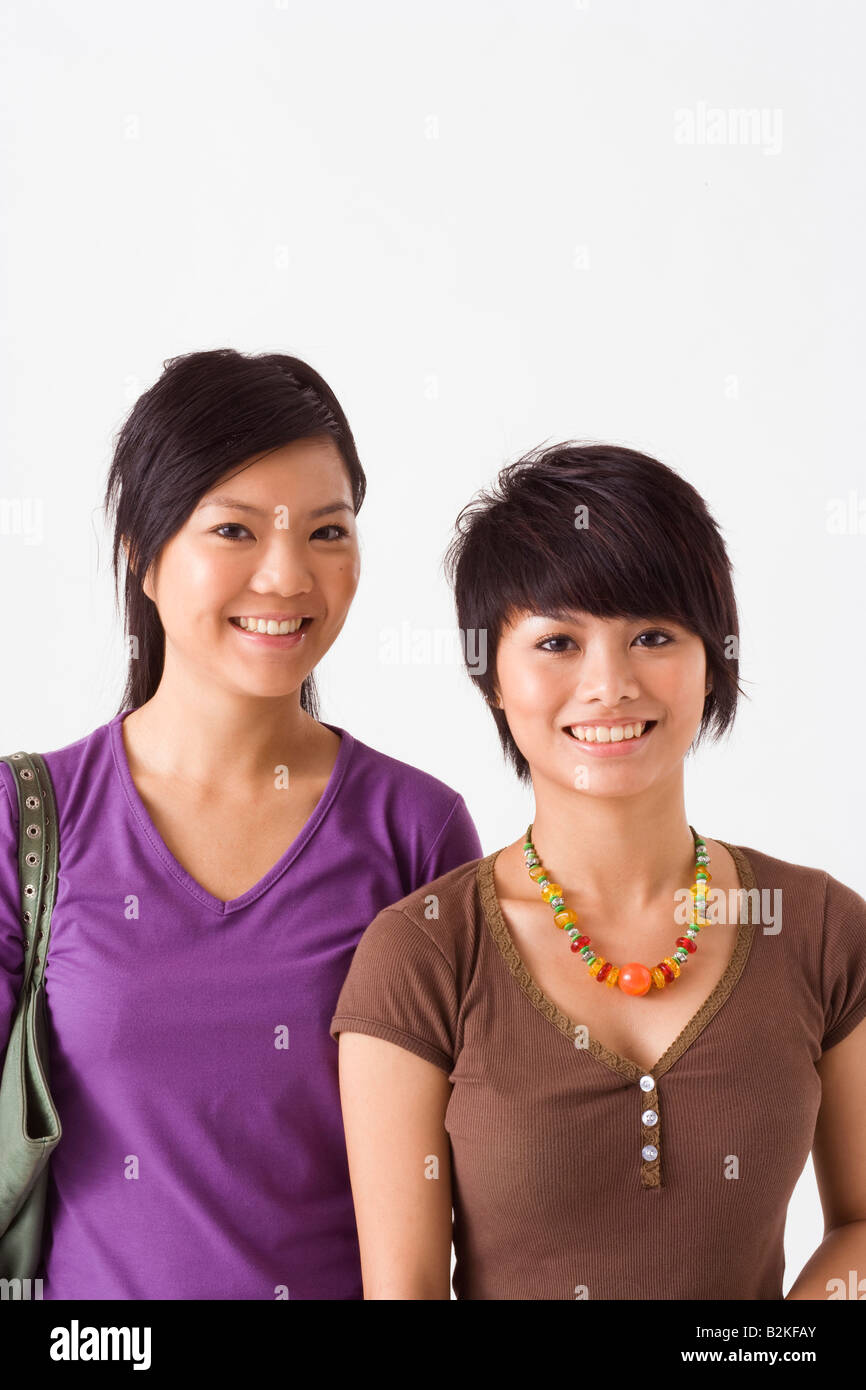 Two women standing together hi-res stock photography and images - Alamy