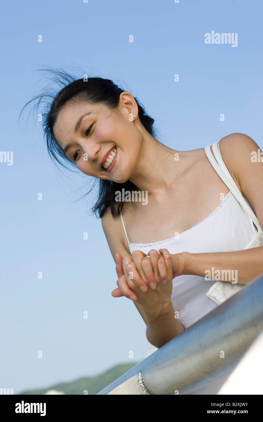 Close-up of a young woman smiling Stock Photo - Alamy