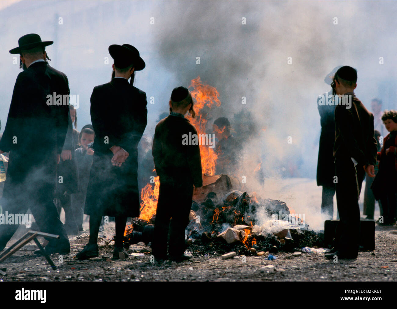 burning bread during jewish passover ritual Stock Photo