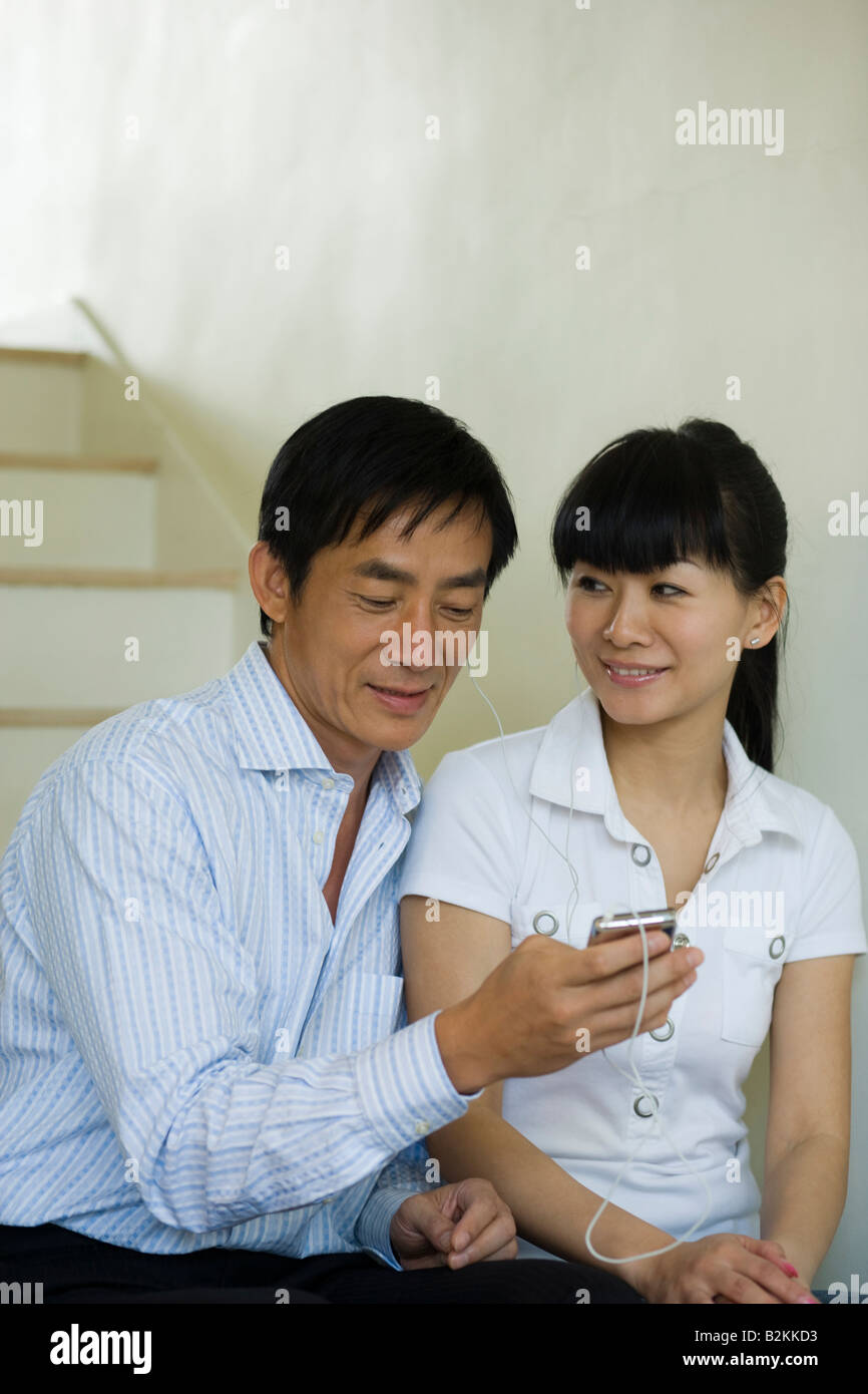 Close up couple listening hi-res stock photography and images - Alamy