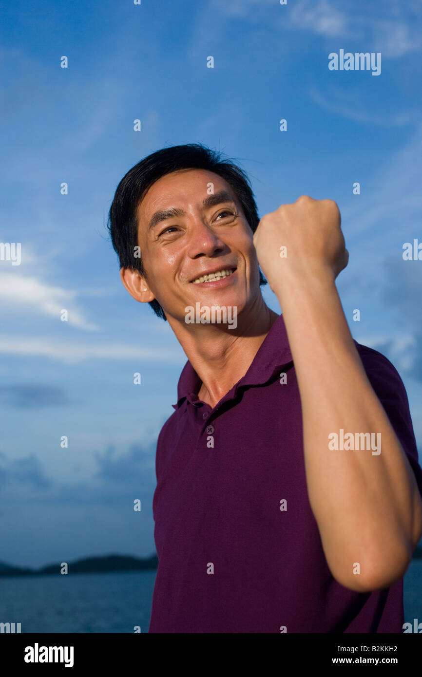 Closeup of a mid adult man punching the air Stock Photo Alamy