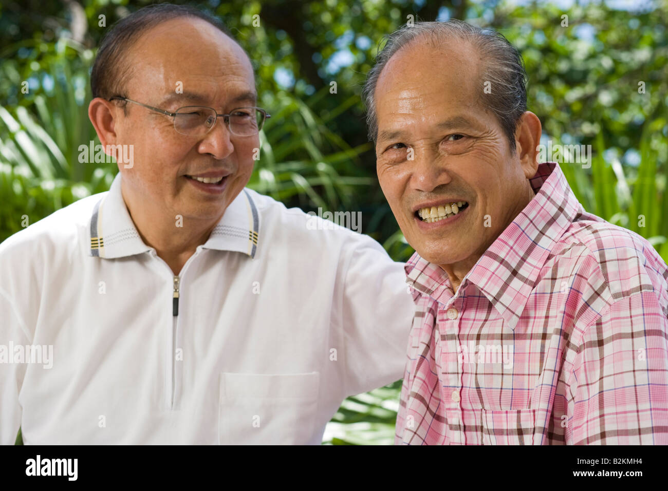 Close-up of two senior men smiling Stock Photo