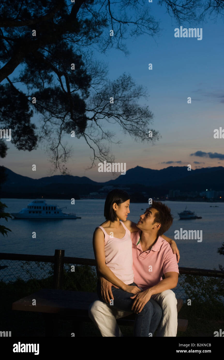 Woman sitting on man lap hi-res stock photography and images - Alamy