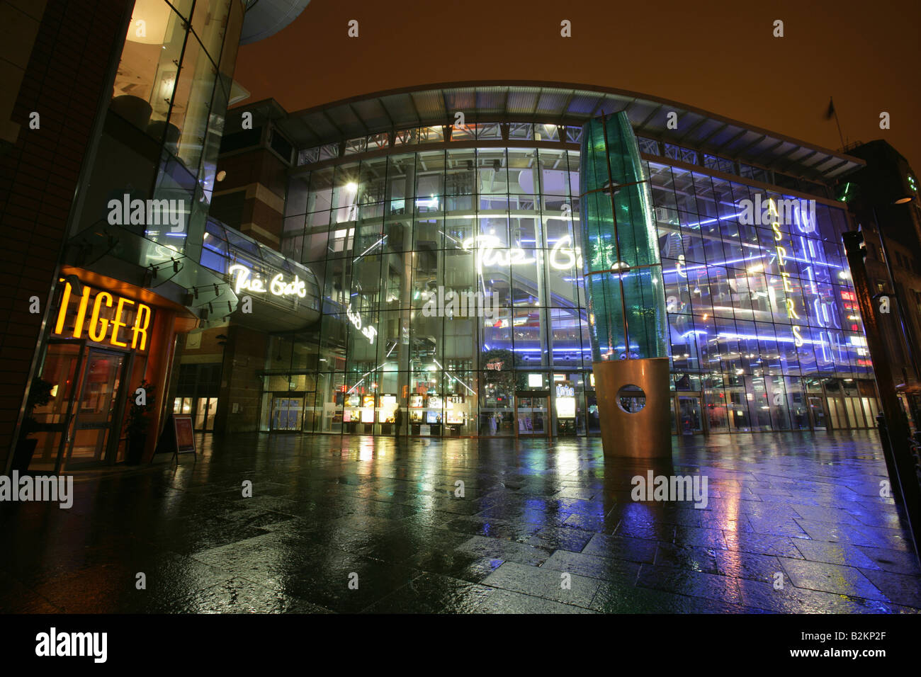 City of Newcastle, England. A rainy night view of The Gate leisure, retail and entertainment complex on Newgate Street. Stock Photo