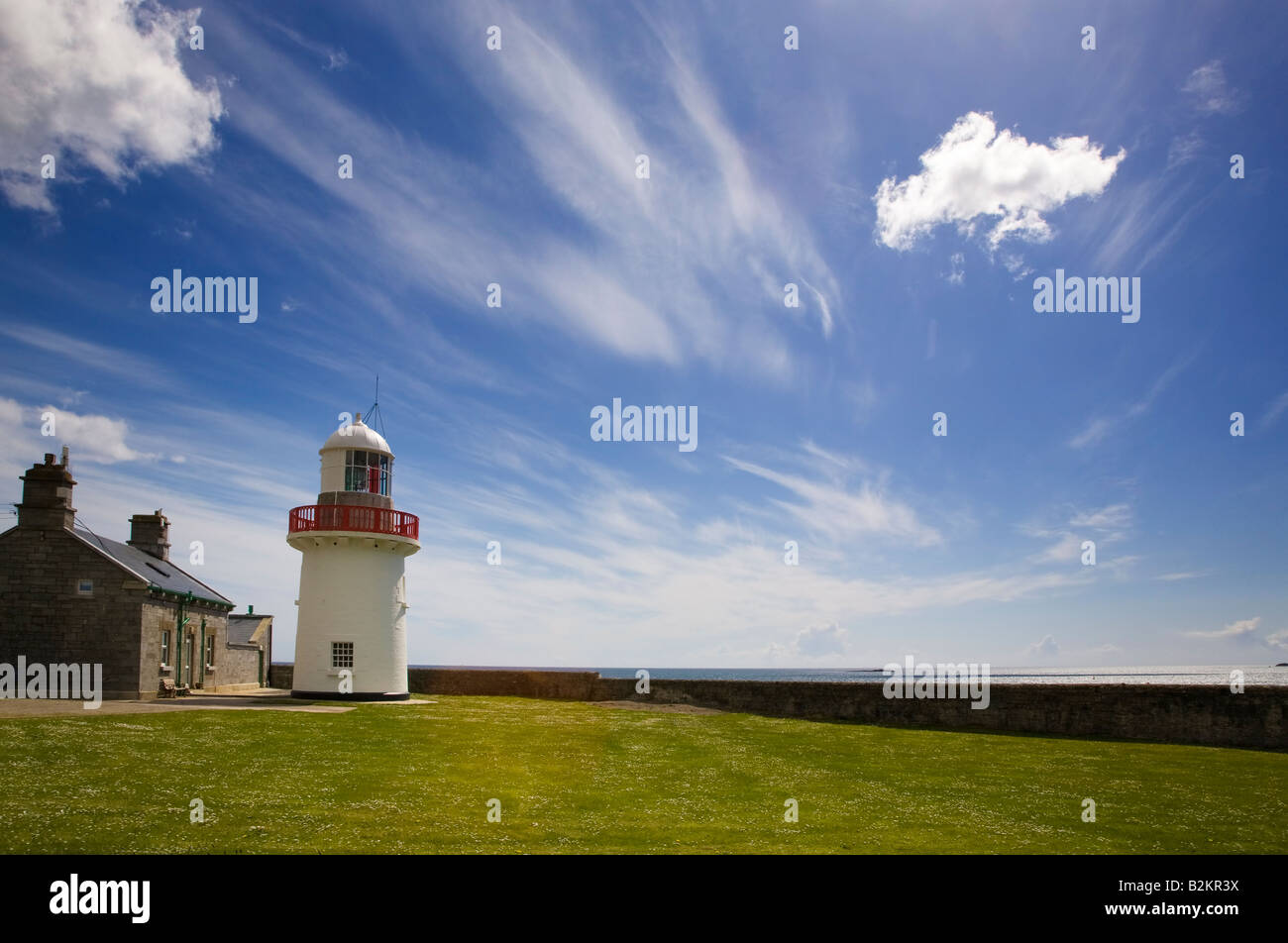Ballynacourty Lighthouse at the entrance to Dungarvan harbour,  County Waterford, Ireland Stock Photo