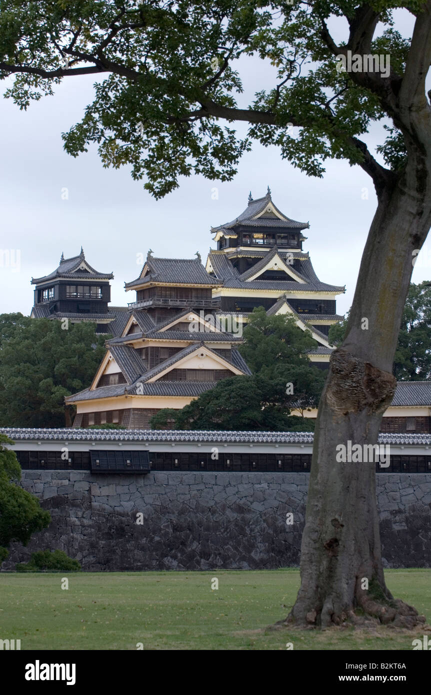 The main tower of Kumamoto Castle in Kyushu Japan seen from beyond the outer wall built in the Azuchi Momoyama style Stock Photo
