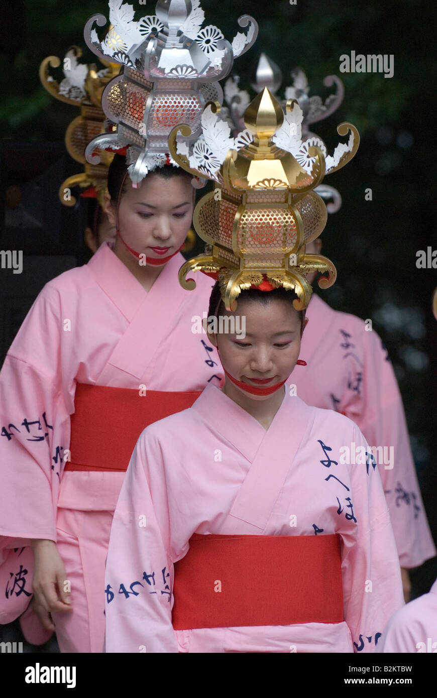 Women in kimono with lanterns on their head partake in the summer Bon odori Yamaga Lantern Dance Festival with 1000 other dancer Stock Photo