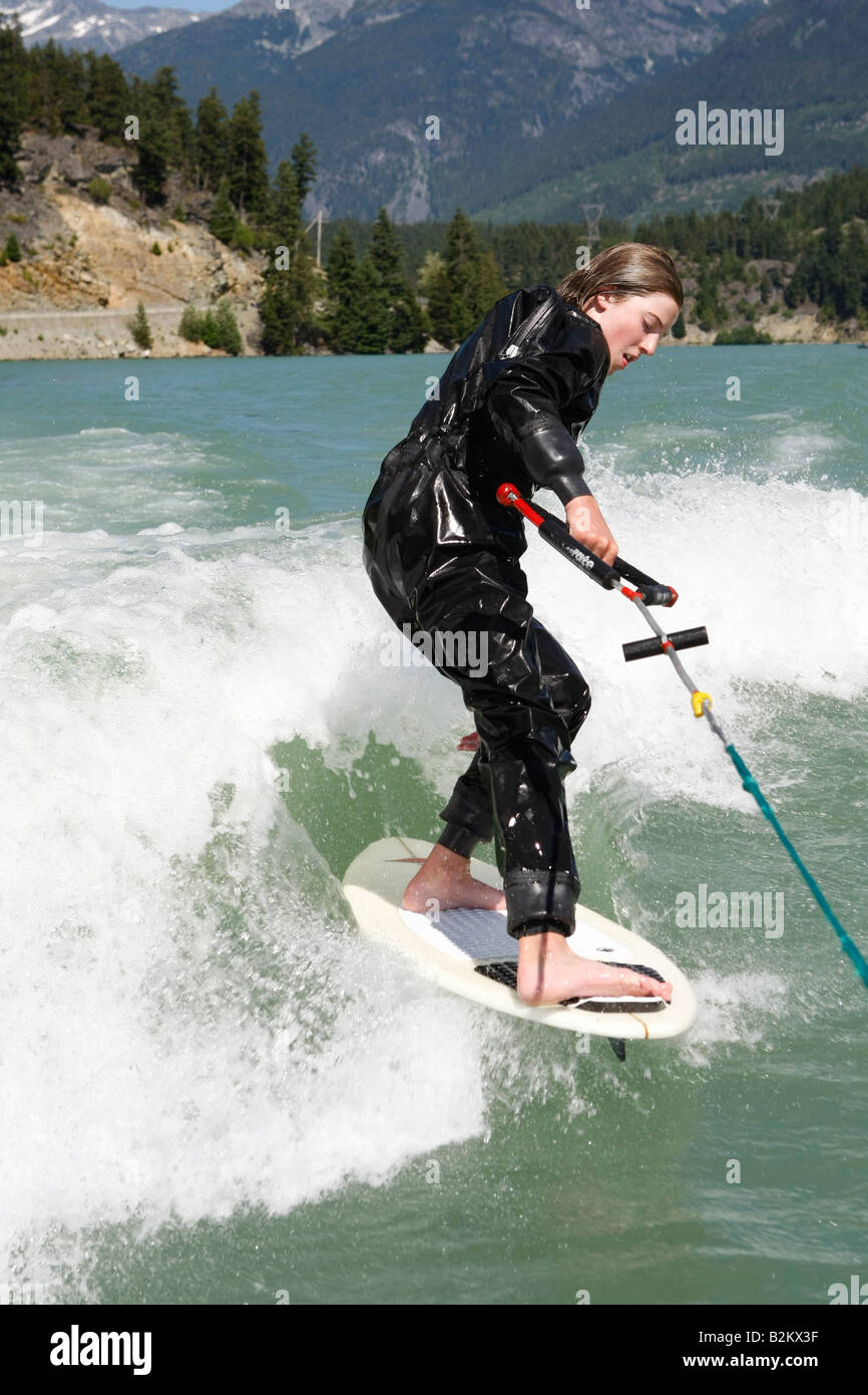 wave riding behind boat