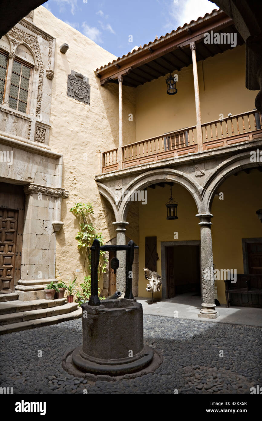 Courtyard with balcony and well Casa de Colon (Columbus's house) Las Palmas Gran Canaria Spain Stock Photo
