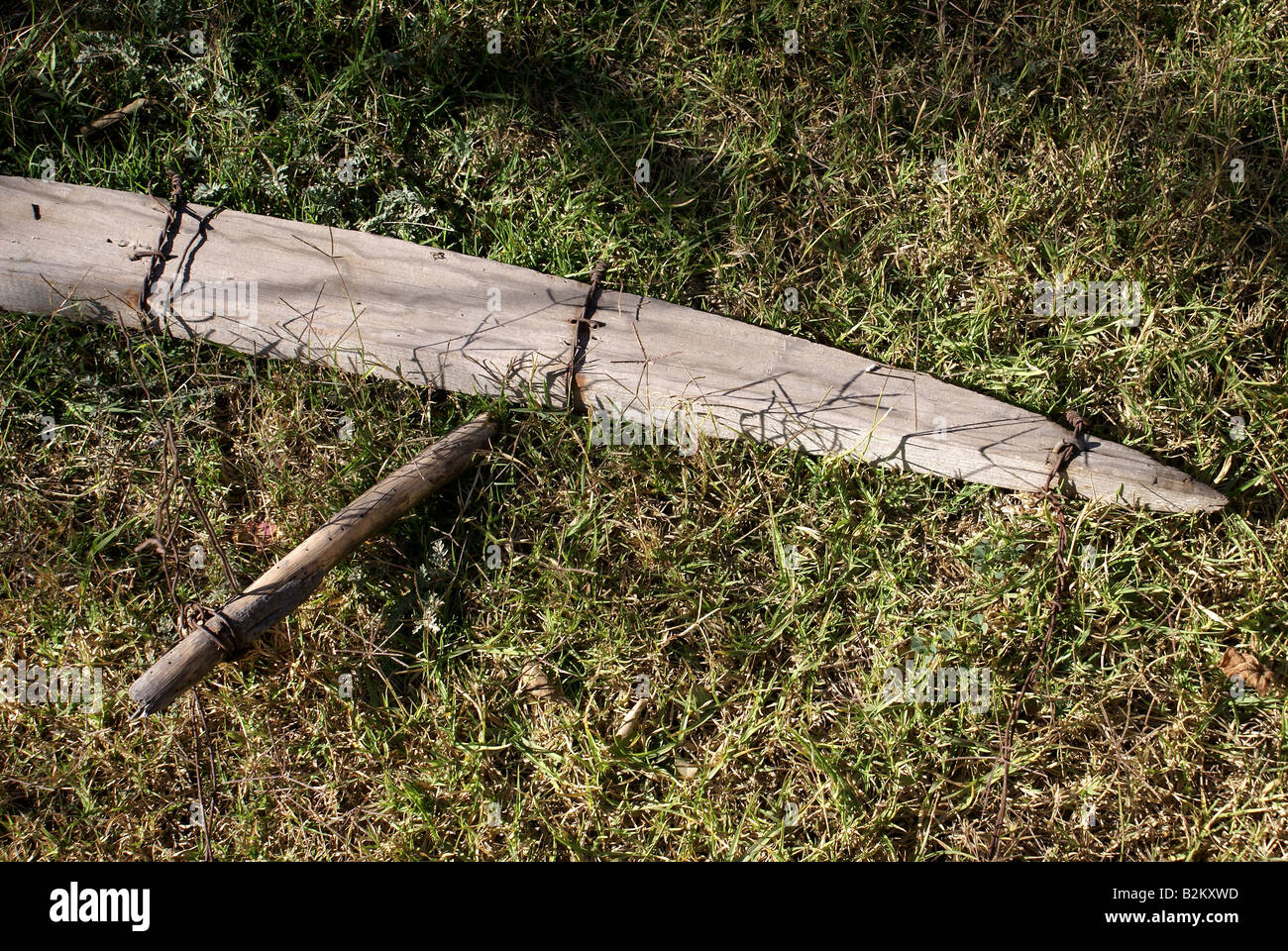 Old gate post for barbed wire fence Stock Photo - Alamy