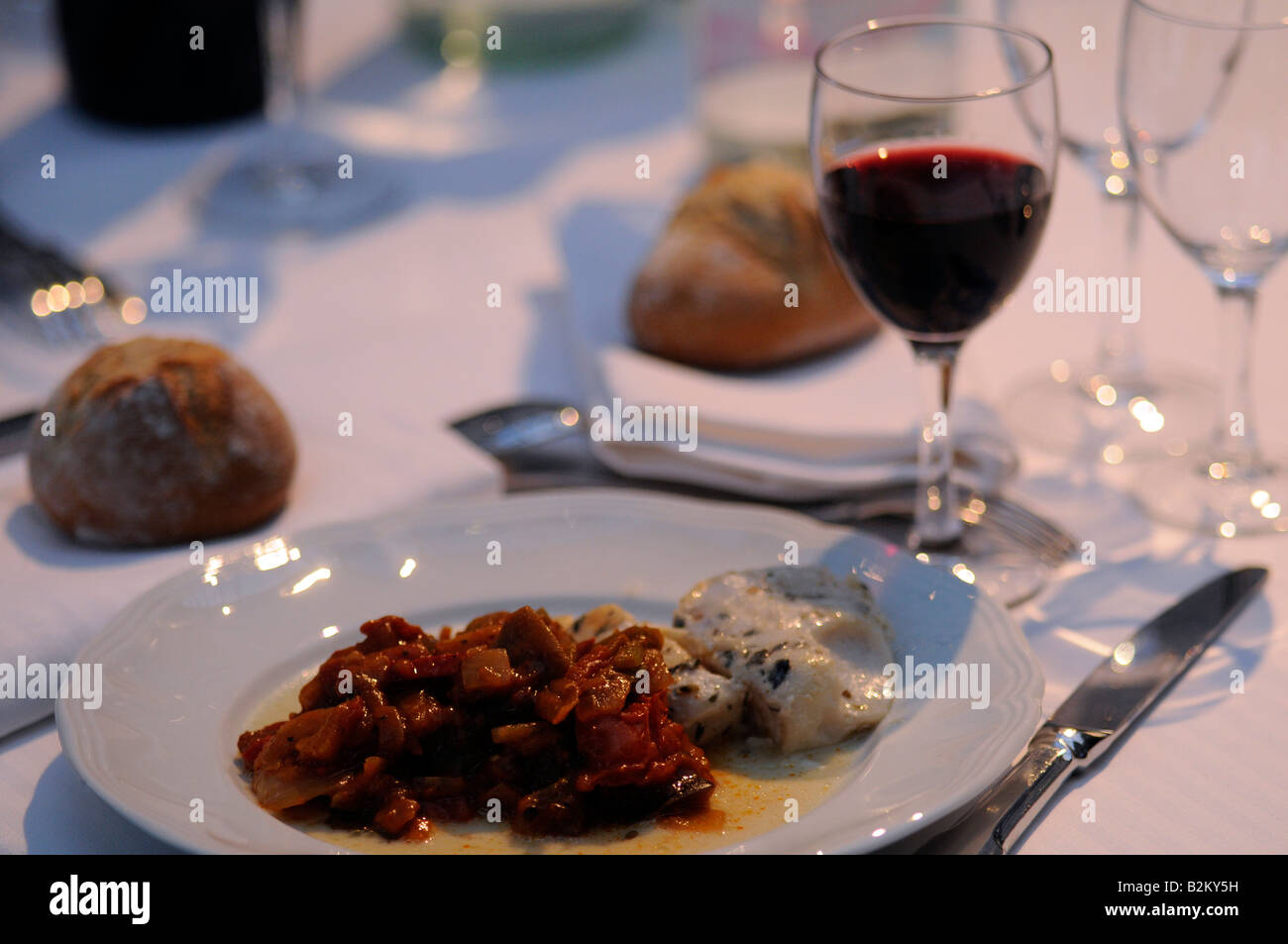 French high gastronomy, ratatouille, with a glass of red wine. Photo taken in Paris, France Stock Photo