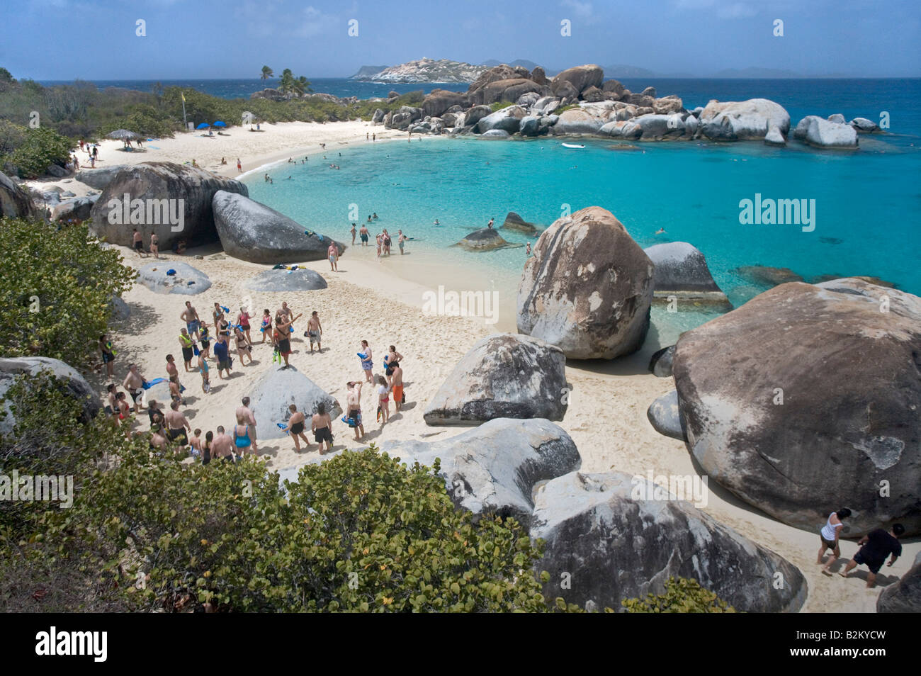 Looking down at Devil's Bay Virgin Gorda BVI Devil s Bay is next to the Baths A tour operator is about to take people snorkeling Stock Photo