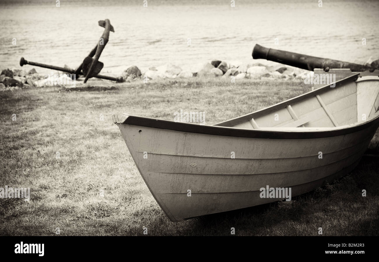 Dory, anchor, and canon Stock Photo