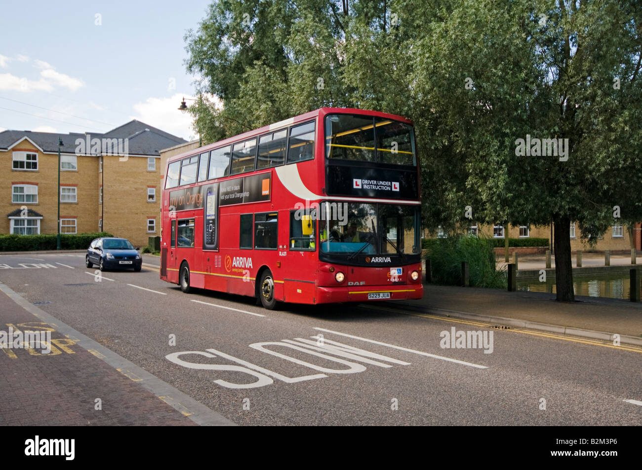 Bus driver under instruction Enfield Island Village United Kingdom