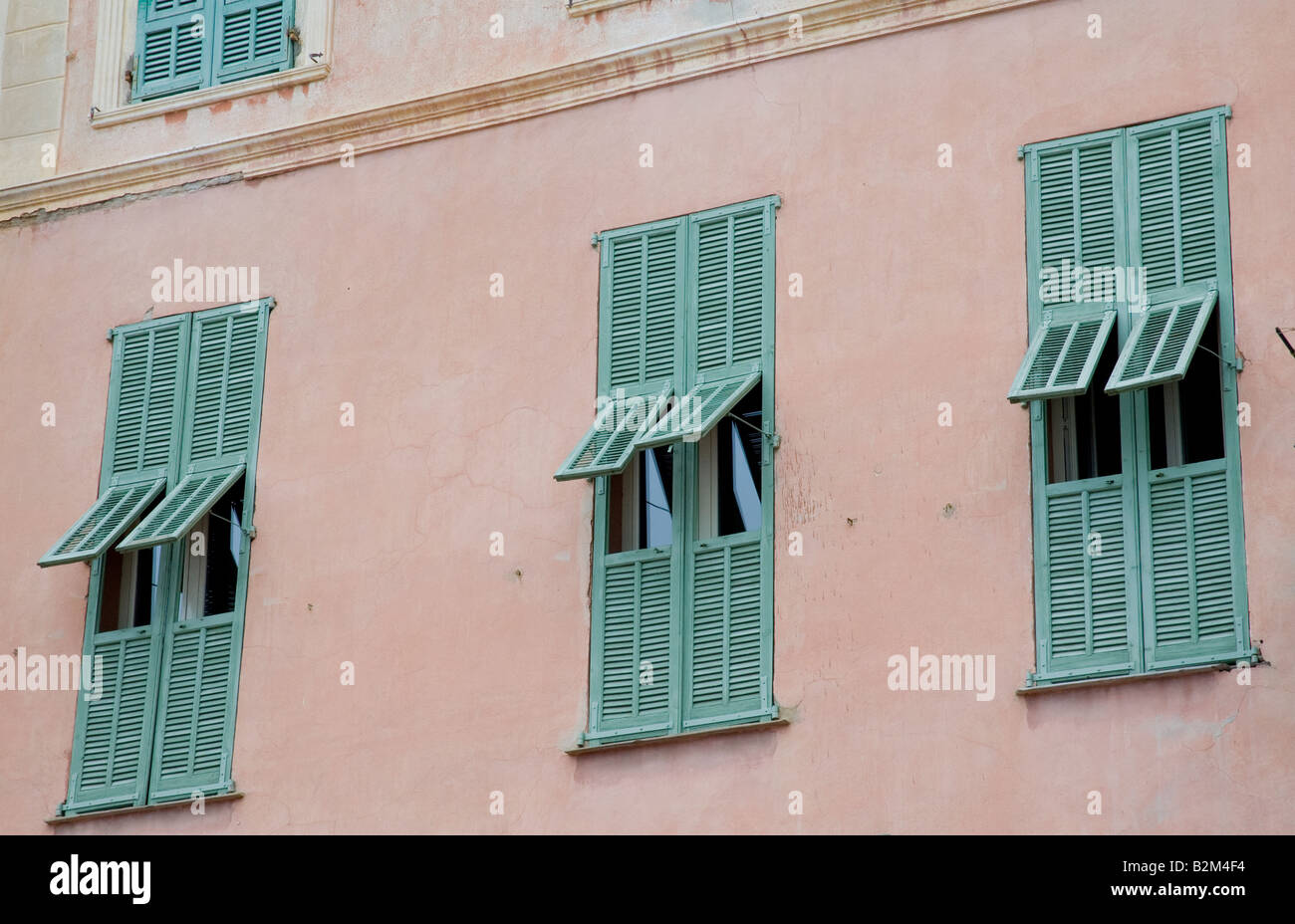 windows of house in france with shutters Stock Photo Alamy