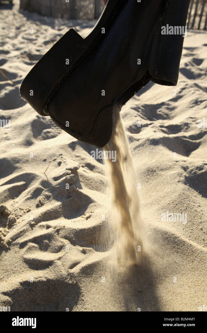 shoe full of sand Stock Photo Alamy