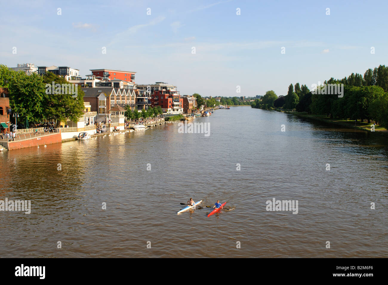 View of Kingston Upon Thames and the river with two canoe boats , UK Stock Photo