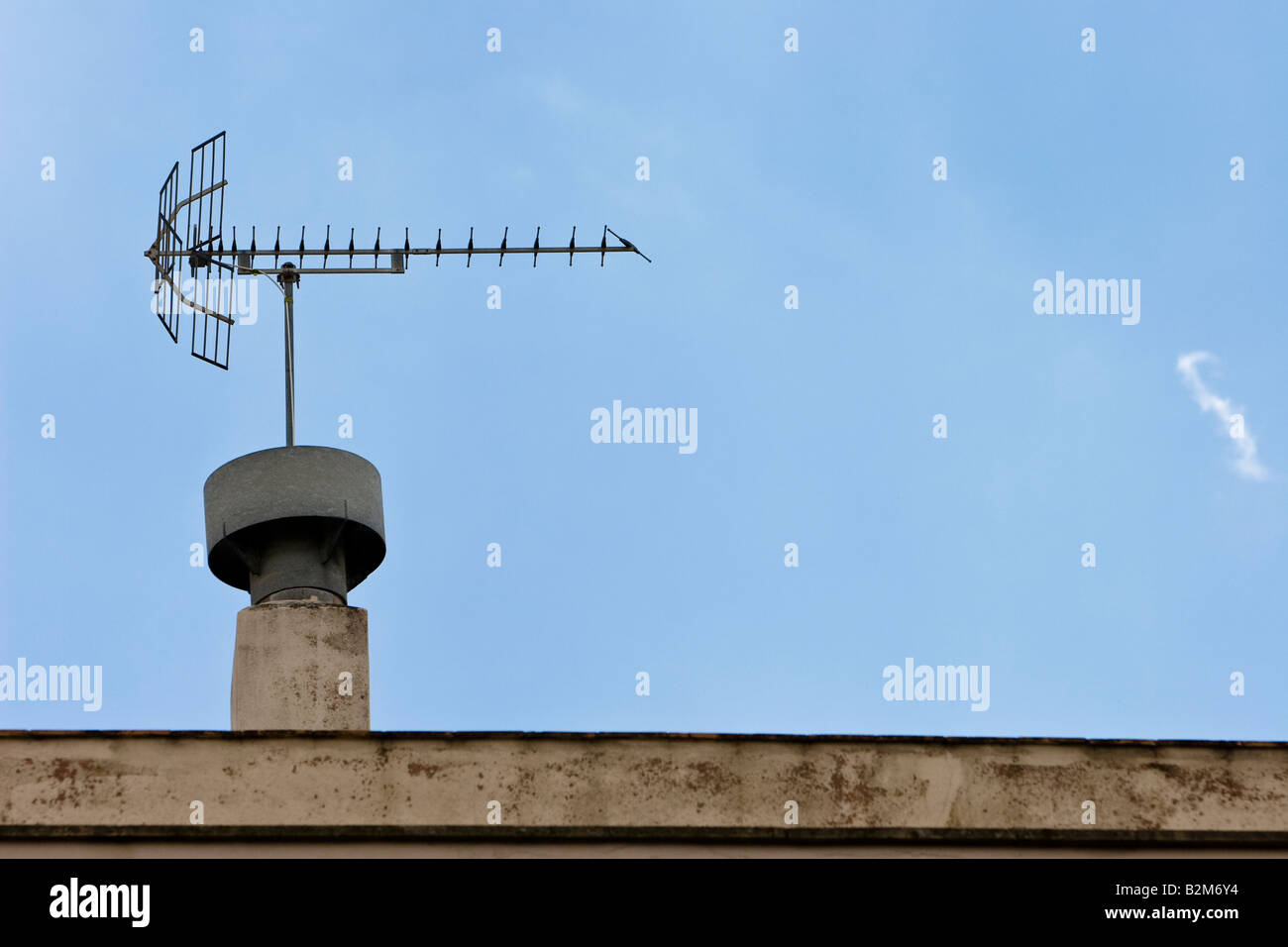 An analog television antenna is seen on a house roof in Arna, Majorca