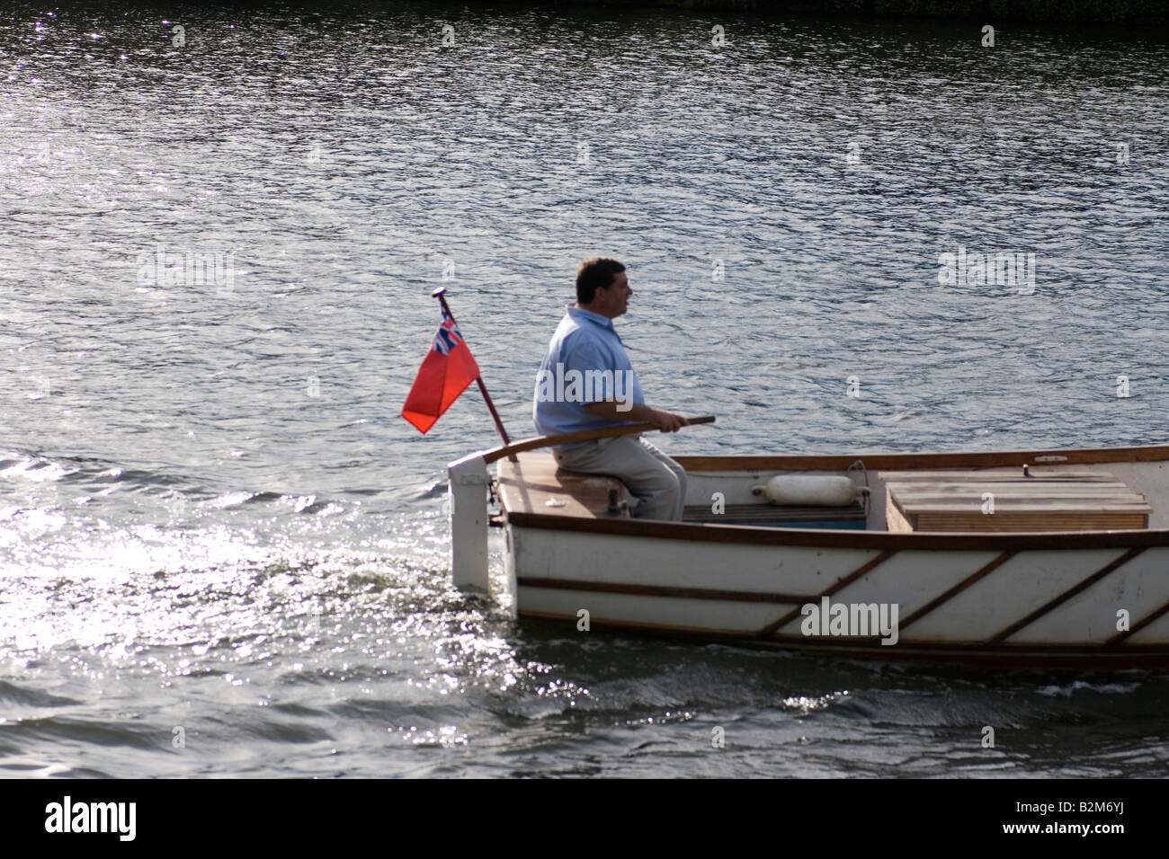 The captain steers his ship Stock Photo Alamy