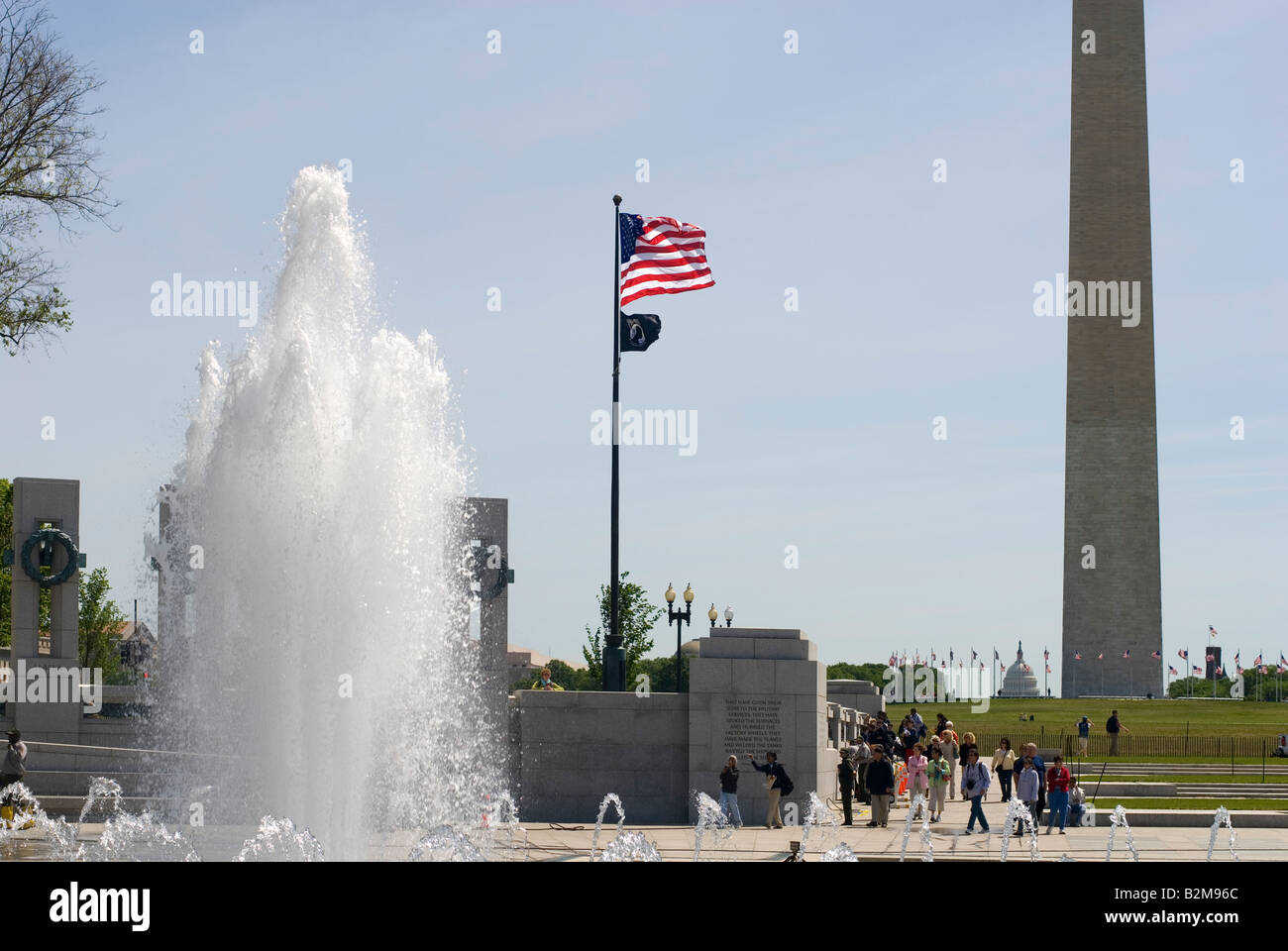 Tourists in Washington DC viewing memorials on the mall Stock Photo