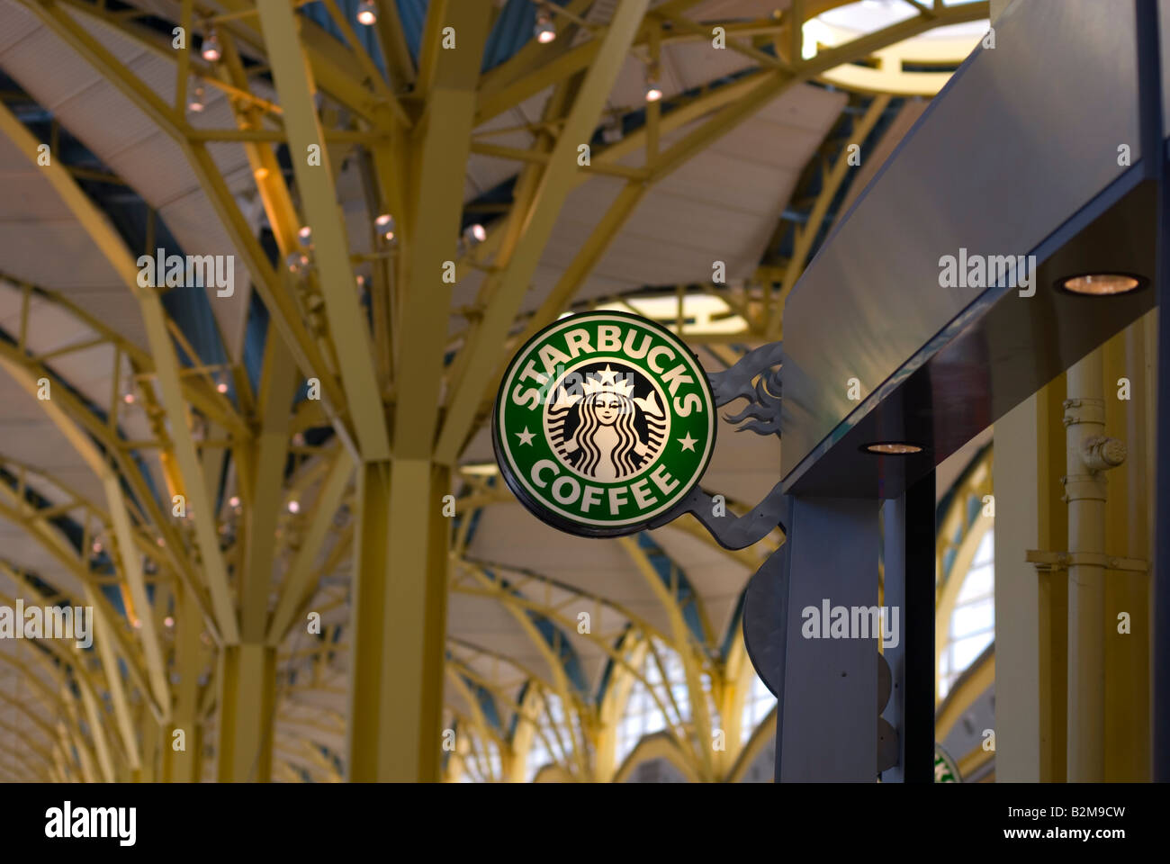Starbucks sign against ceiling at Ronald Regan National Airport Stock Photo