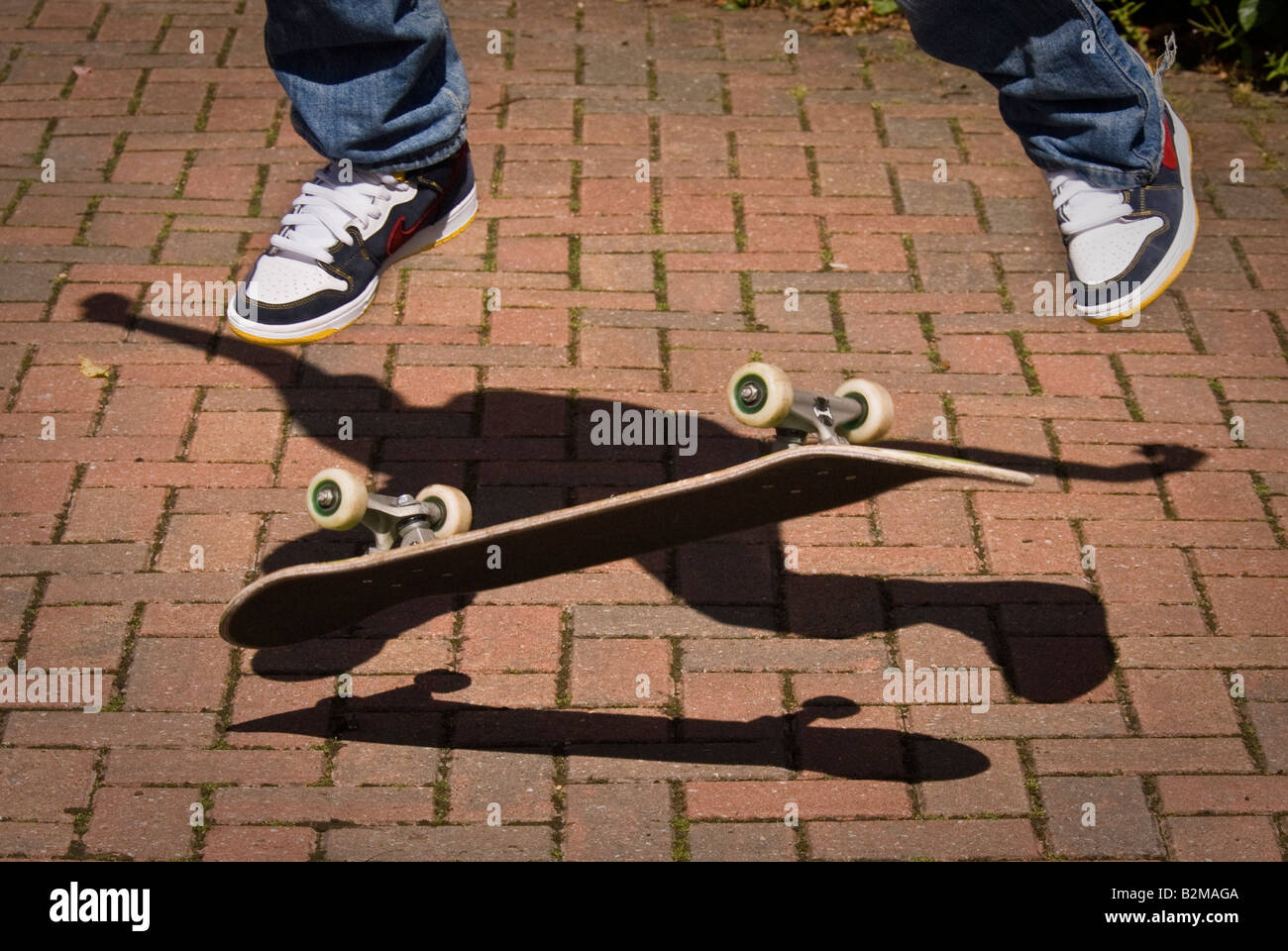 Skateboard and shoes Stock Photo Alamy