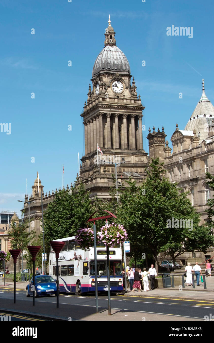 Leeds town seen beyond the Headrow and trees in Victoria Square Stock Photo
