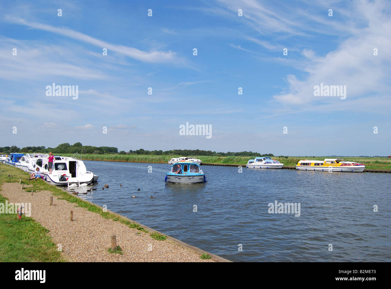 Boats on River Bure at Acle Bridge, Norfolk Broads, Norfolk, England, United Kingdom Stock Photo