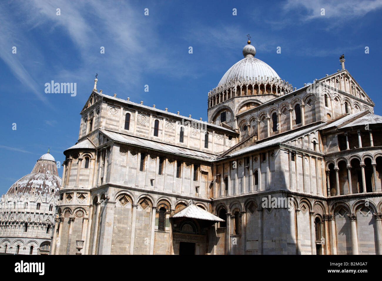 exterior of the duomo with the baptistry behind campo dei miracoli pisa italy tuscany europe Stock Photo