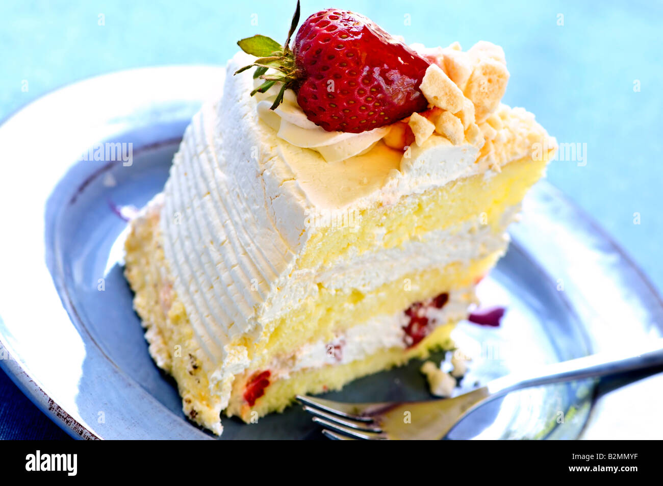 Slice of strawberry meringue cake on a plate Stock Photo Alamy
