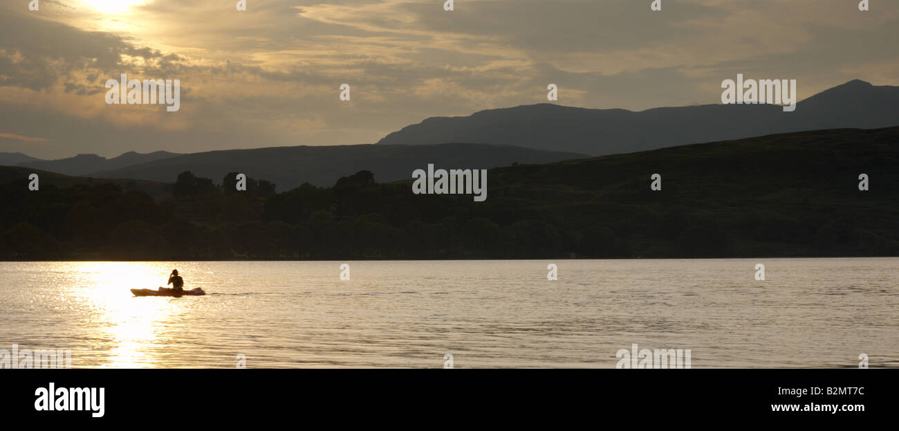 Canoe in the Late Evening Light on Coniston Water Stock Photo - Alamy
