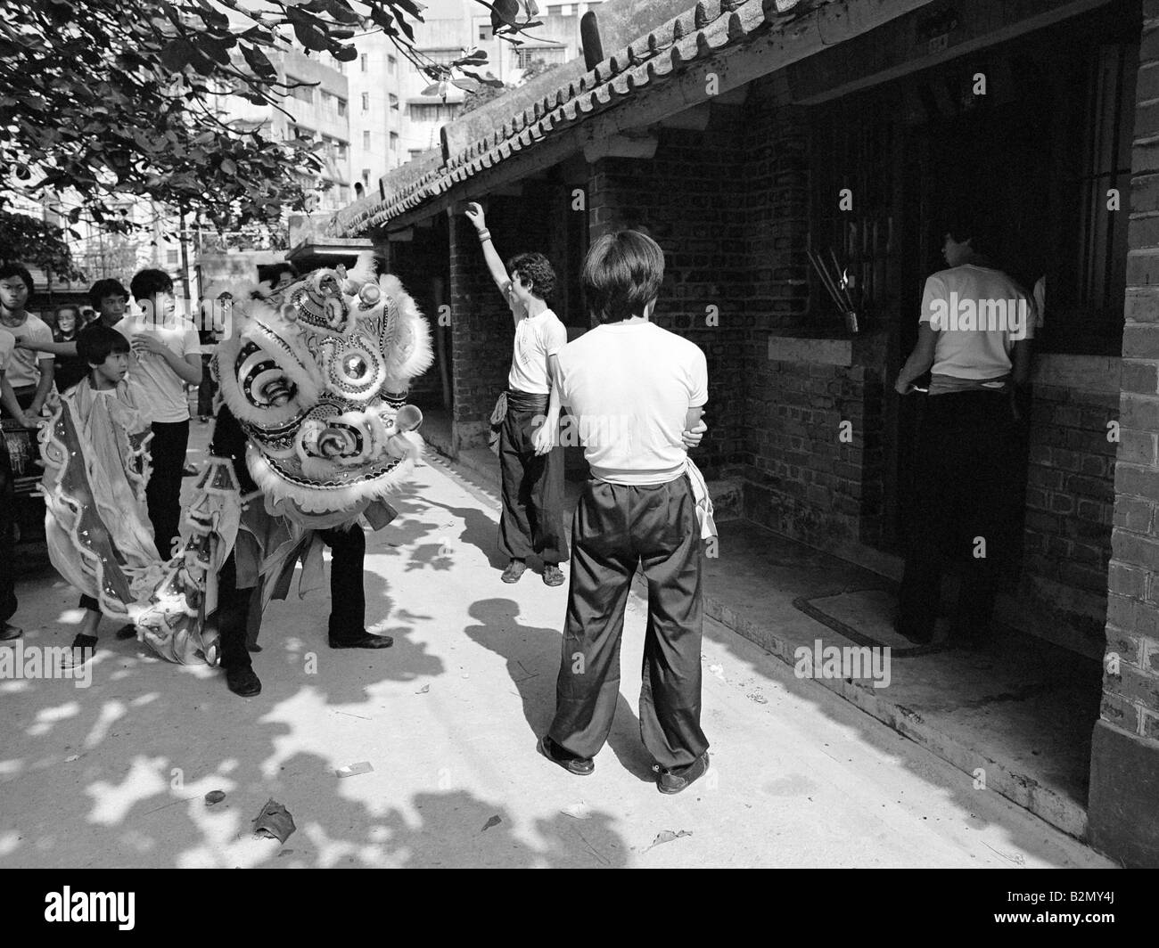 Lion dance first footing at Chinese New Year Stanley Village Hong Kong 1979 Stock Photo