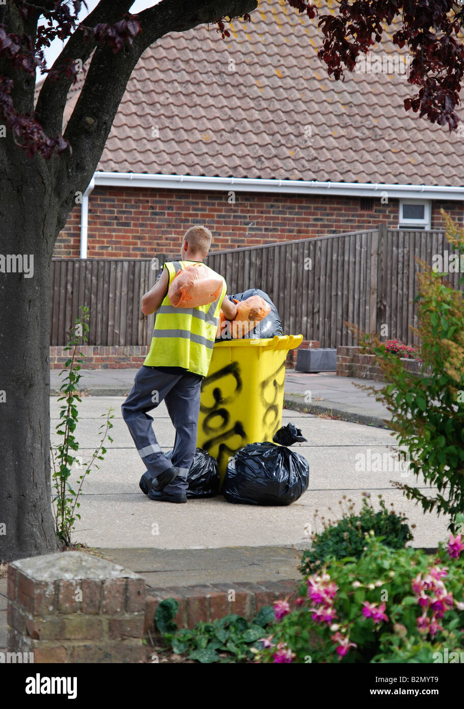 dustman colllecting rubbish for landfill Worthing Adur area West Sussex Stock Photo Alamy