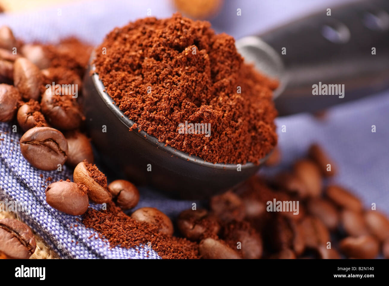 freshly ground coffee beans and measure Stock Photo Alamy