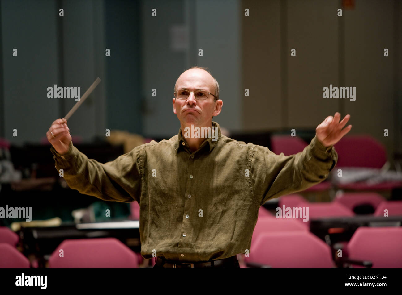 The conductor Professor Ruediger Bohn at work. Stock Photo