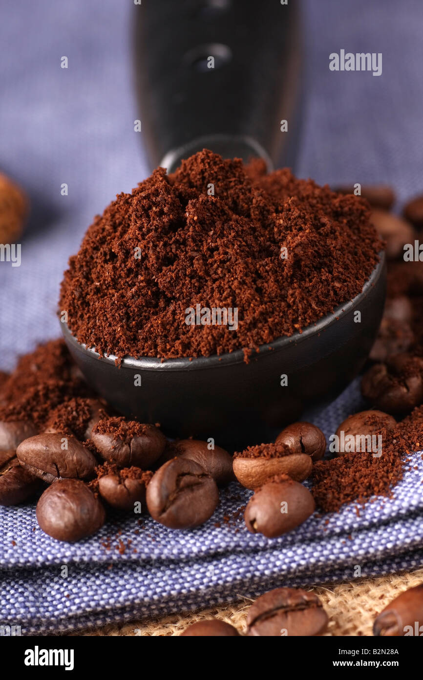 freshly ground coffee beans and measure Stock Photo Alamy