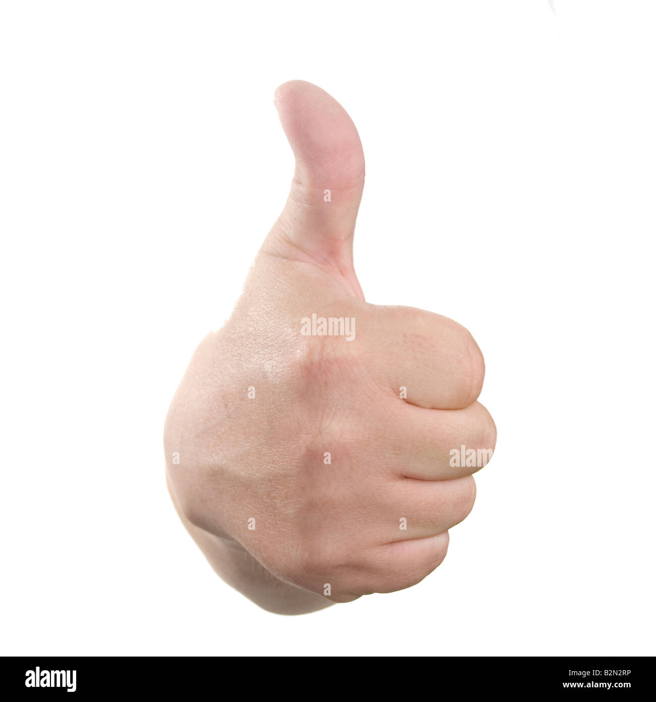 Hand shaped in thumbs up position against white back drop Stock Photo
