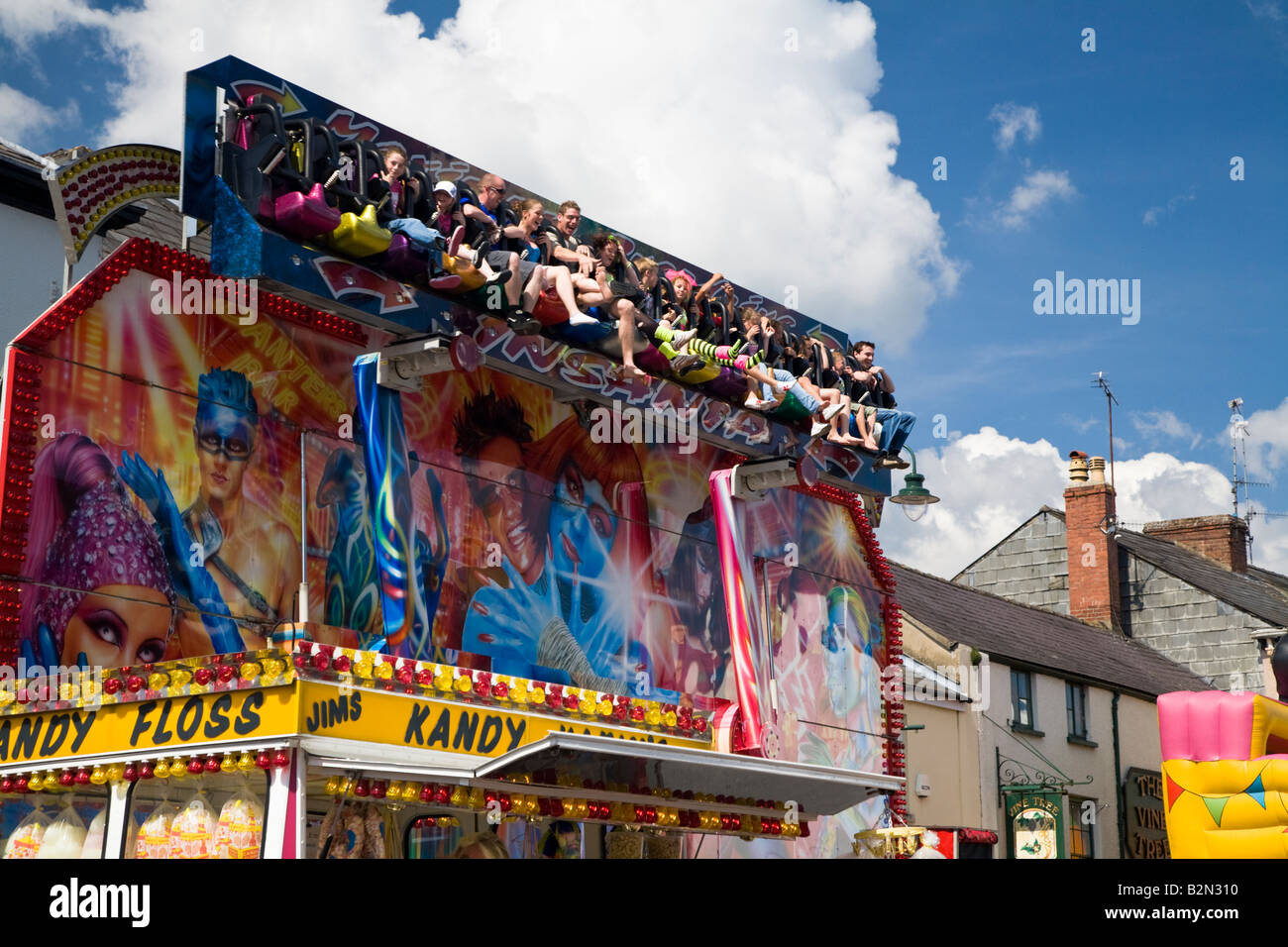 Funfair Ride, Monmouth Carnival, People having fun on Fairground ride. Stock Photo