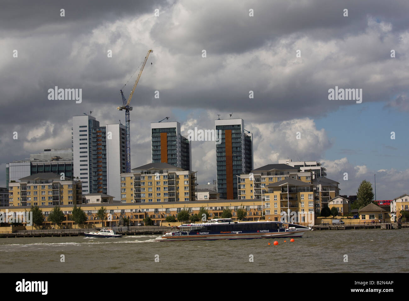 Apartment blocks towers on River front at Poplar London GB UK Stock Photo