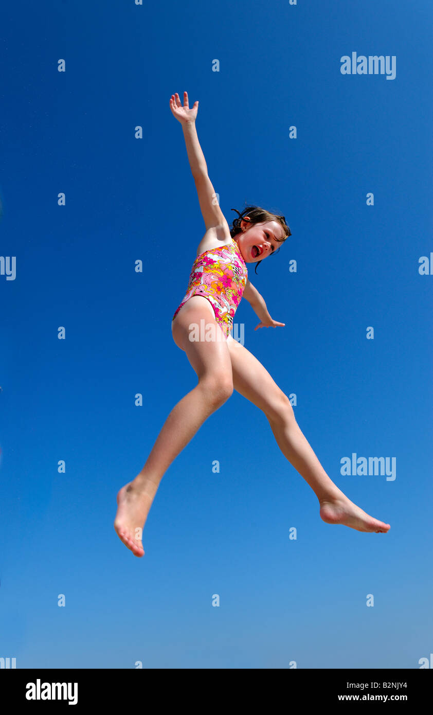 Girl Jumping For Joy High Resolution Stock Photography and Images - Alamy