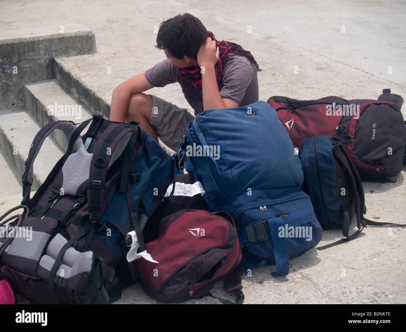 backpacker surrounded by luggage waiting for a ferry on Koh Samui island in  Thailand Stock Photo - Alamy