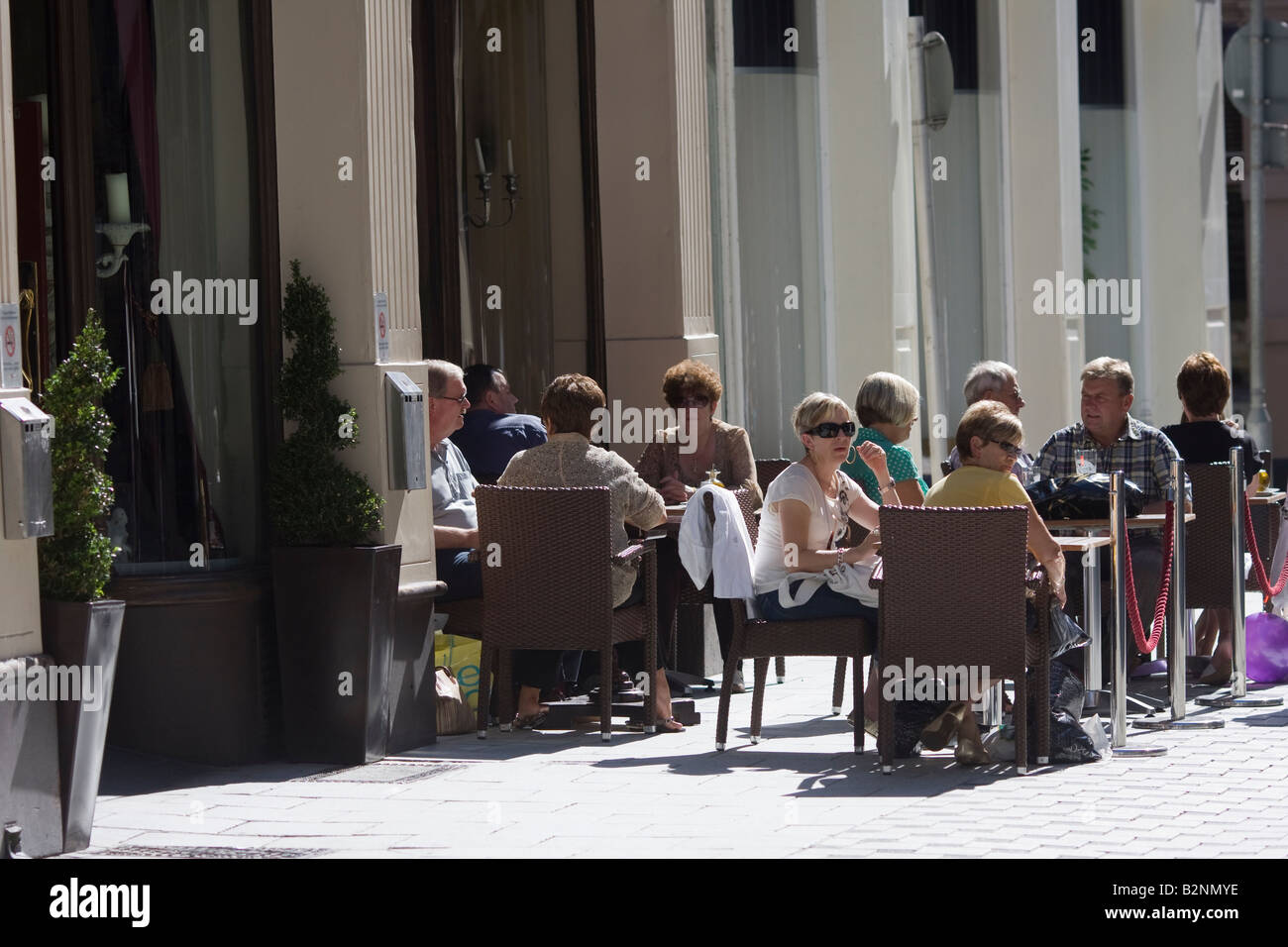 Eating and drinking outside a cafe bar restaurant Cardiff Stock Photo
