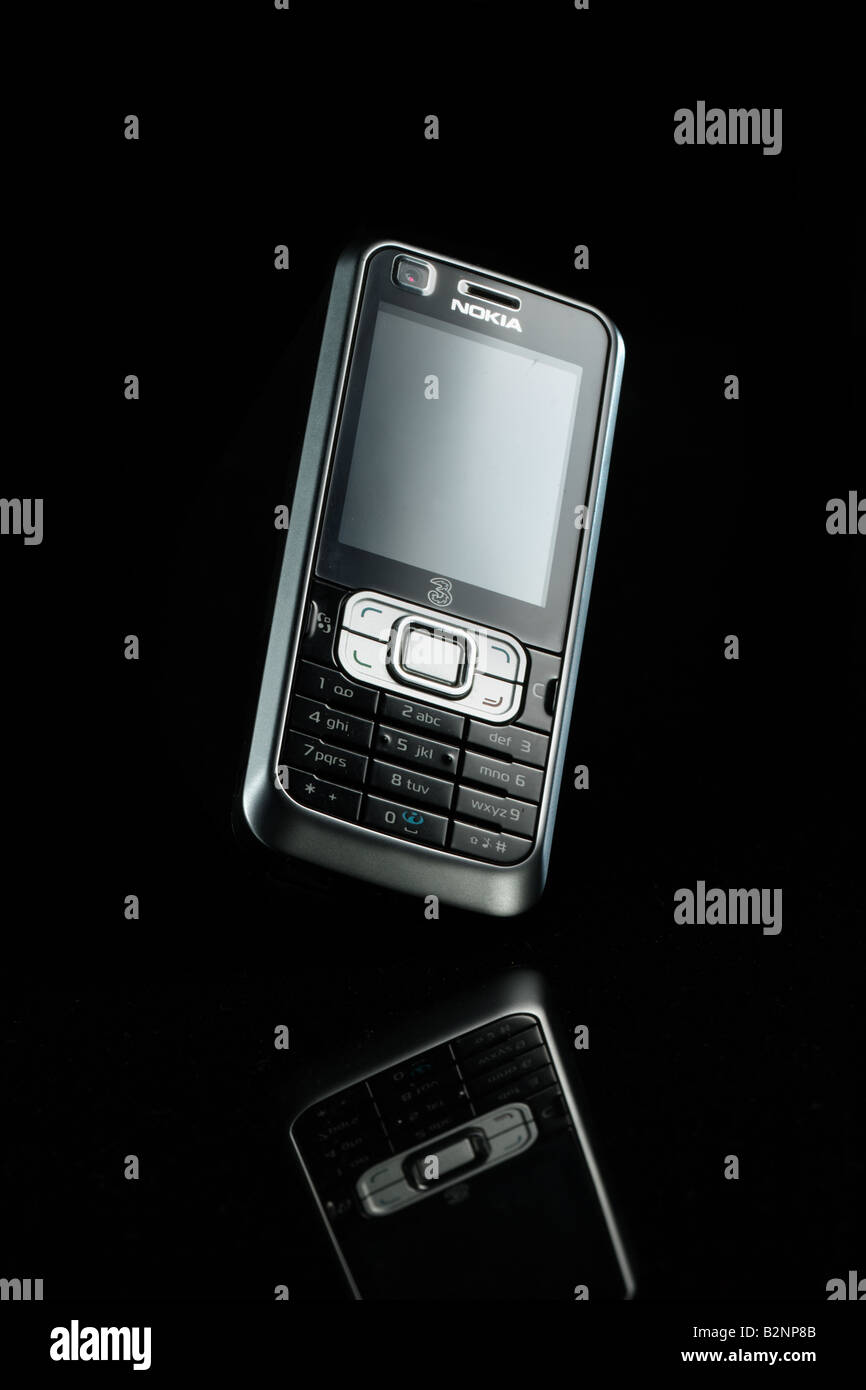 Nokia 6120 Mobile Phone Leaning Back On Black Background Stock Photo