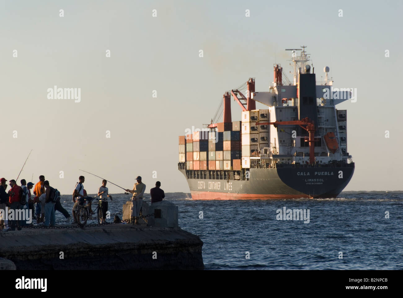 CARGO SHIP LEAVING THE PORT OF HAVANA CUBA DURING THE PERIOD OF TRADE EMBARGO Stock Photo