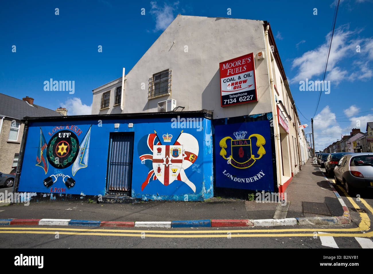 Murals in Bond Street, Waterside, Londonderry, of the union flags, Loyalist Prisoners Of War and Ulster Defence Association Stock Photo