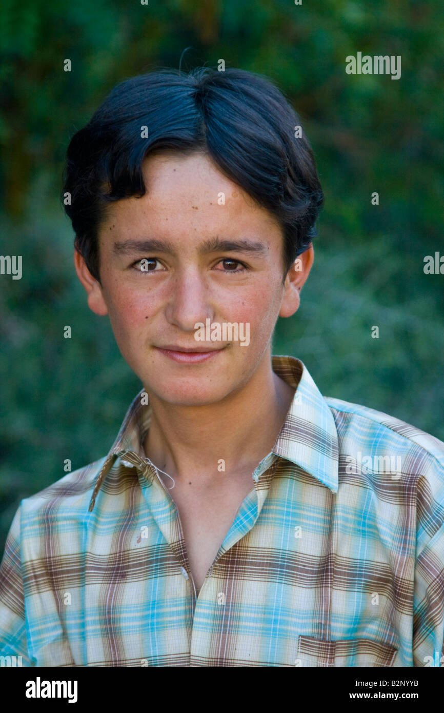 Ismaili Pakistani Boy in Passu in the Hunza Valley in Northern Pakistan Stock Photo