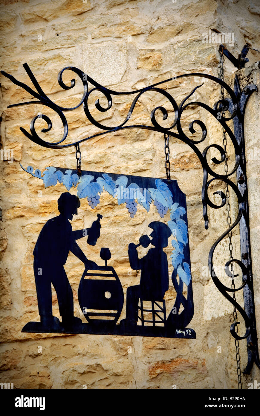Wine tasting France Wrought iron sign hanging outside small Burgundy