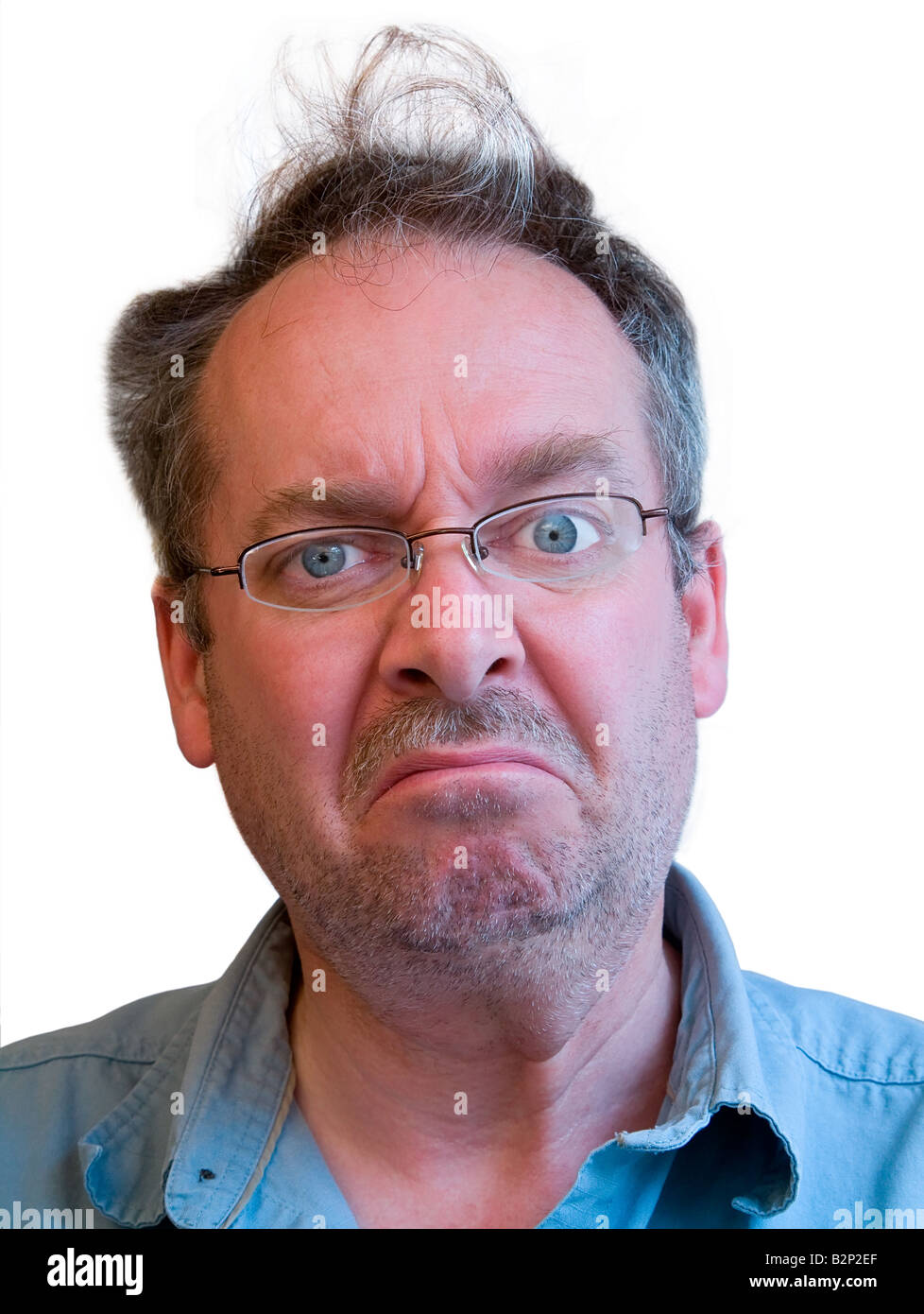 Portrait of a grumpy man with unkempt hair and a neglected appearance Stock Photo