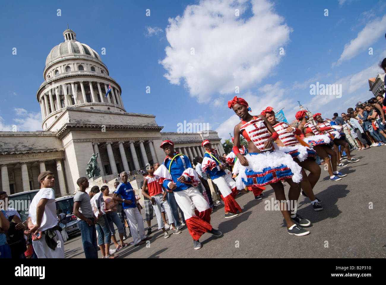 Afrocuban carnival group Los componedores de batea performing in front of the Capitolio in La Habana Vieja Havana Cuba Stock Photo