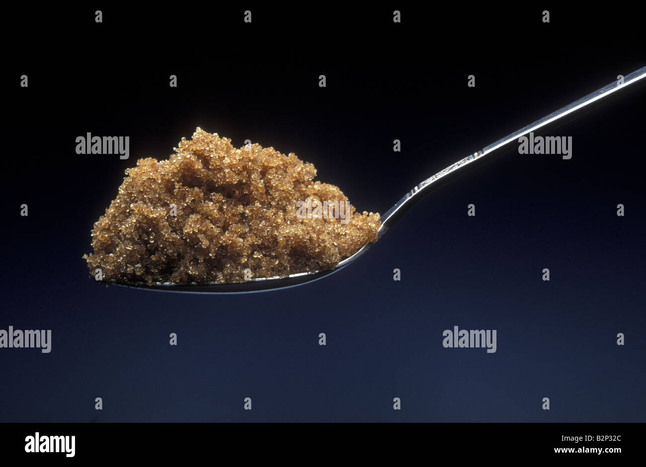 A spoonful of brown sugar Stock Photo Alamy